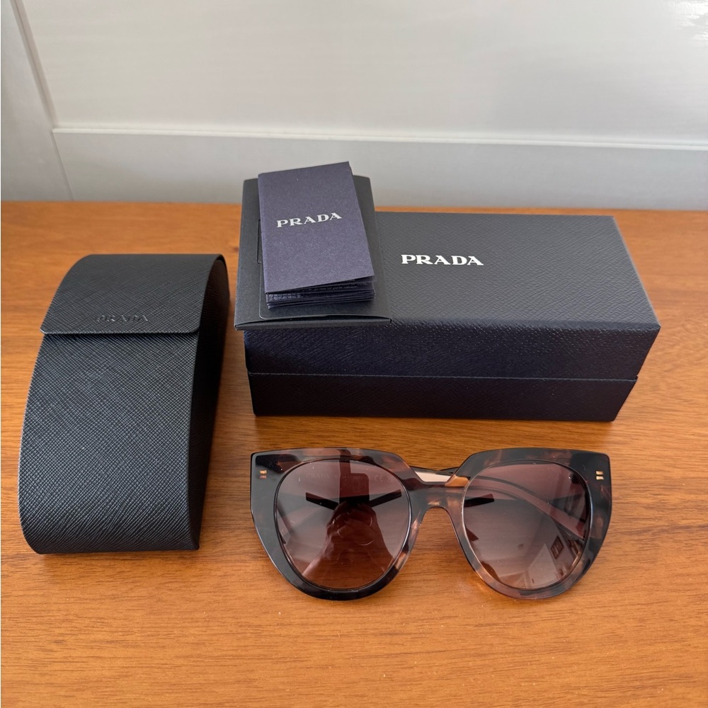 Prada Women’s Cream and Tortoise Sunglasses